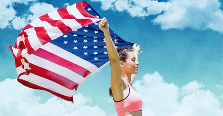 Composition of female athlete holding american flag against clouds on blue sky