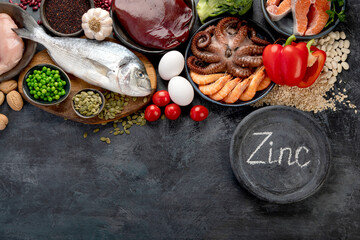Obraz na płótnie Canvas Food high in zinc on dark background. Healthy eating concept.