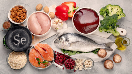 Food high in selenium on light gray background. Healthy eating concept.