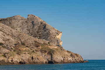 Fototapeta na wymiar Landscape with Beautiful Black Sea coast and alchak mountan in Sudak town, Crimea, Ukraine