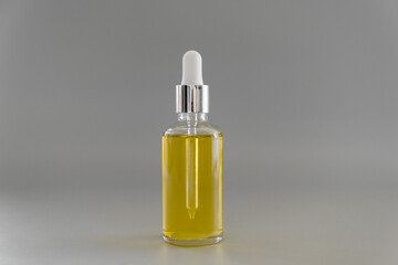 Dropper glass bottles with pipette. Transparent hyaluronic natural beauty mineral product and eco serum skin care concept. Top horizontal view copyspace. Summer juicy colors