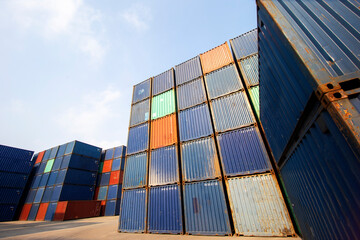 Row of Stacking Containers of Freight Import/Export Distribution Warehouse. Shipping Logistics Transport Industrial, container box in warehouse in shipping port.