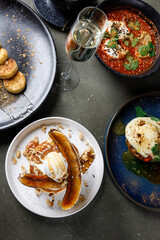 Pancakes with banana, caramel and ice cream scoop