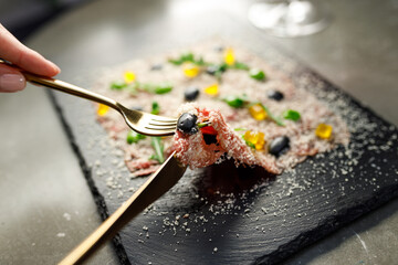 Veal carpaccio with dried yolk and parmesan