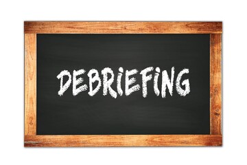 Obraz premium DEBRIEFING text written on wooden frame school blackboard.