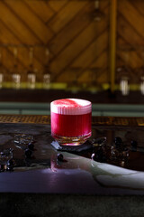 Alcohol bar, cocktail glass on bar counter, cocktail glass in a bar