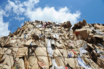Almaty, Kazakhstan - 06.17.2016 : Large piles of garbage collected for recycling at the factory.
