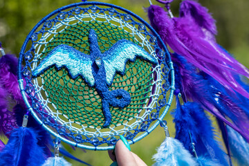 Handmade dream catcher with feathers threads and beads rope hanging