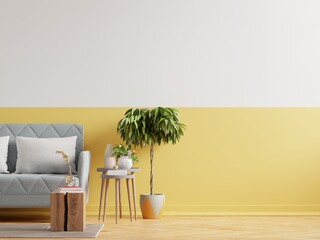 Modern minimalist interior with sofa on empty yellow wall background.