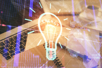 Double exposure of bulb drawing and desktop with coffee and items on table background. Concept of...