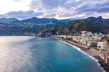 Naklejka premium Aerial drome sunset view of resort village Minori Amalfi coast Italy