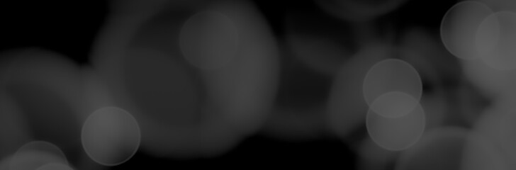 black and white background with light bokeh