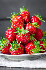 Strawberry fruit berries ripe  sweet dessert organic copy space food background rustic top view keto or paleo diet vegan or vegetarian food