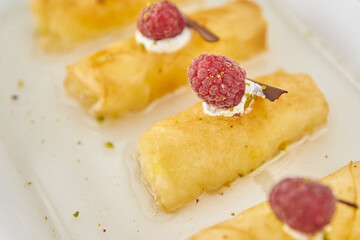 Sweet Syrupy Snacks with Raspberries On Top