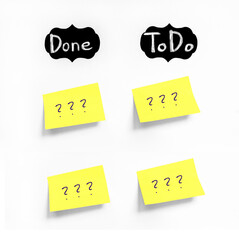 Yellow sticker with Question marks  on white Whatman paper. Chalk text Done and ToDo on black labels. Concept learn, starting education. Handwriting text close up isolated, copy space