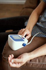 Fototapeta premium measures blood pressure with a sphygmomanometer