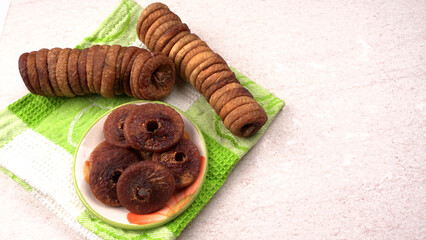 Fresh Figs or Anjeer fruit healthy vegan food concept organic dry fruits on wooden background.