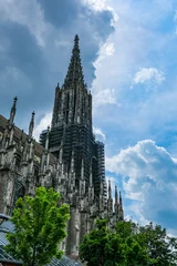 Fotobehang View of Ulm Minster tower - the tallest church in the world, taken on a beautiful summer day. © Michaella