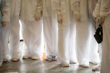 A group of doctors in protective medical suits during the coronavirus epidemic.