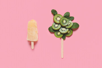 Composition with ice-cream and ripe kiwi on color background