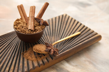 Composition with aromatic cinnamon on color background