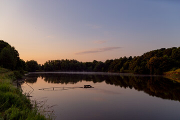 Fototapeta na wymiar incredible sunset by the lake