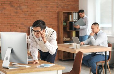 Male accountants working in office
