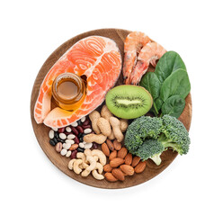 Plate with healthy products rich in vitamin E on white background