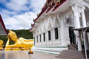 Buddha reclining attitude statue of Wat Khao Sung Chaem Fa temple on Khao Sam Sip Hap mountain for...