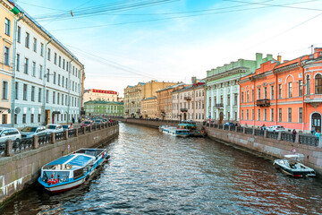 Canal in St. Petersburg with a beautiful view, a summer postcard of a tourist city