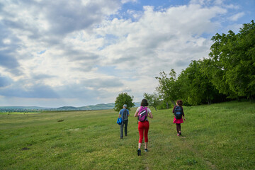 Hikers Walking at The Edge of Forest