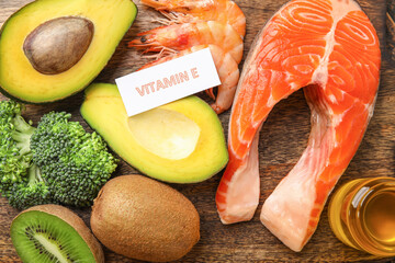 Board with healthy products rich in vitamin E, closeup