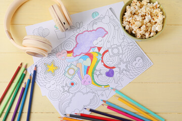 Fototapeta premium Composition with coloring picture on wooden background