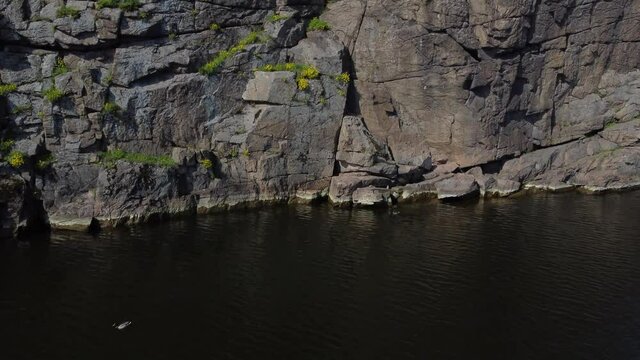 Aerial View of Beautiful Rocks above the River. Rocky Coast