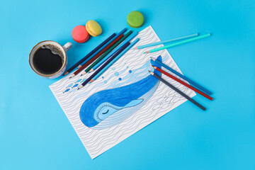 Composition with coloring picture on table