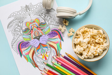Composition with coloring picture on table