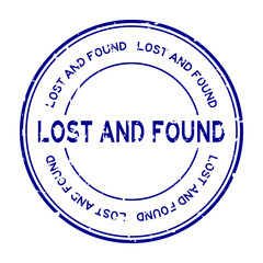 Grunge blue lost and found word round rubber seal stamp on white background