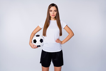 I'm ready Photo of serious lady skilled player soccer women team stand calm listen coach hold leather ball wear football uniform t-shirt shorts isolated white color background