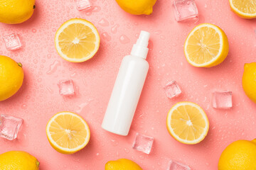 Top view photo of white spray bottle without label in the middle ice cubes water drops halves and whole yellow lemons on isolated pastel pink background with blank space