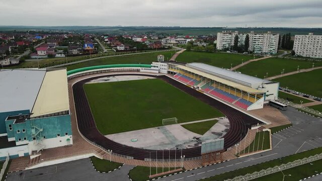 city stadium located on the street. aerial drone shooting