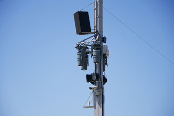 An example of installation on a street lighting pole of sound and light equipment, a wi-fi router...
