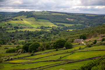 Fototapeta na wymiar English landscape with green hills and cloud sky