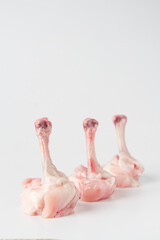 Naklejka premium Raw chicken Lollypops, white background, isolated.