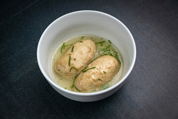 Steam cutlet on a dark table
