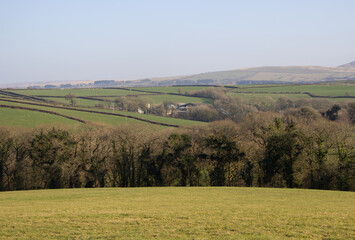 Fototapeta na wymiar typical North Devon farm land with the Dartmoor National Park in the background