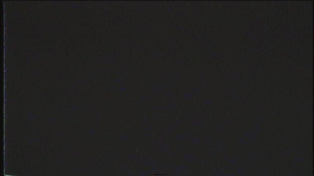 Videocassette recorder VCR or VHS defects, artefacts and Noise. Glitches of old damaged tape cassettes. Static TV noise. Retro vintage background. 4K Looped footage for Overlay
