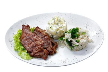 Beef steak with potatoes and rice in isolated white background