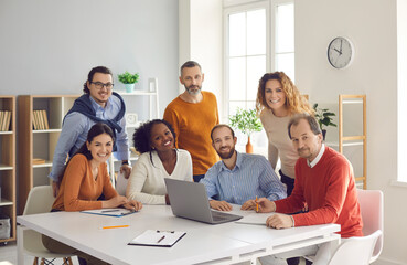 Happy diverse group of people different age nationality work in office together. Multiethnic...