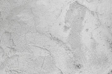 Naklejka premium Grunge old rustic washed wall of natural aged mortar. Uneven country chalk path on lumpy pitted flooring earth. Crannied bumpy stiff damaged land. Rugged broken shabby rough soil for 3D grungy design