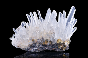 Amazing pure Quartz Crystal cluster gemstone closeup macro isolated on black background. Natural...